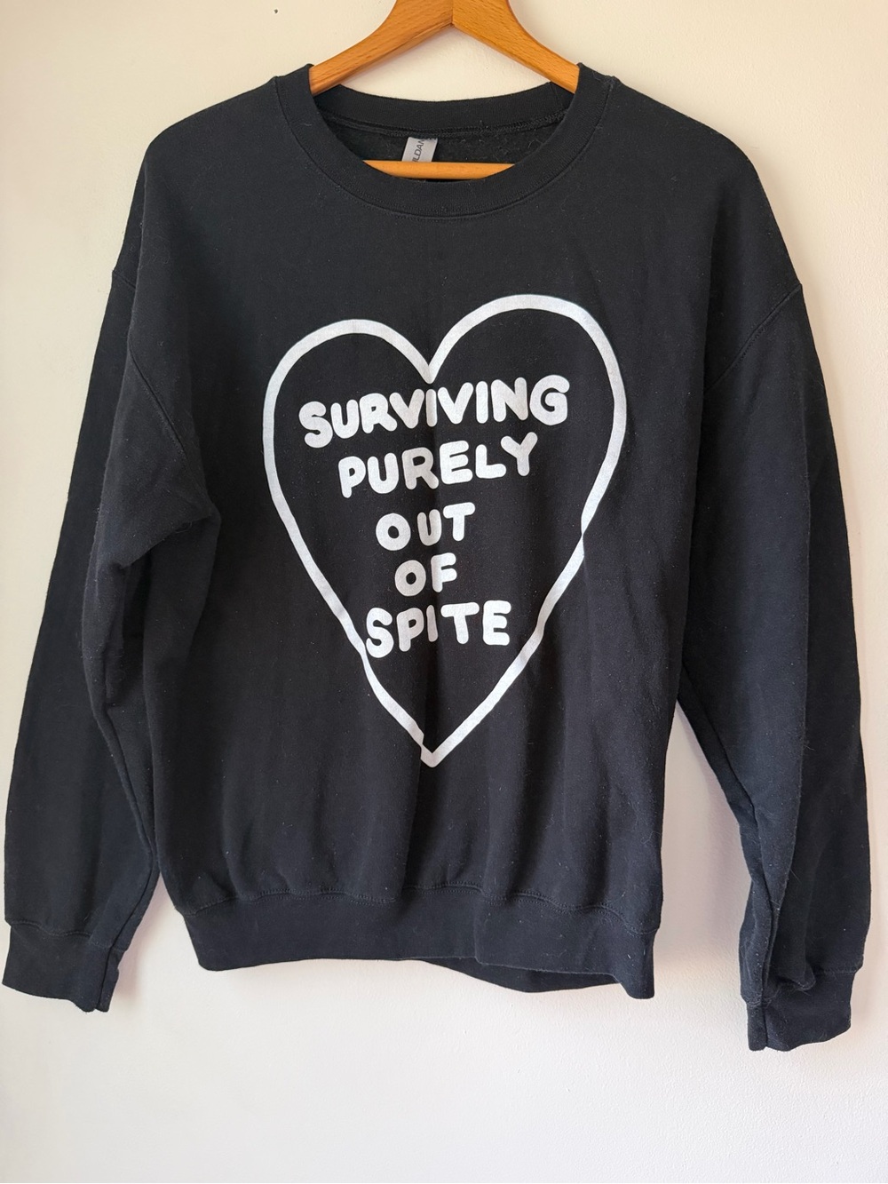 Black Crewneck Sweater with White Heart Graphic - Surviving Purely Out of Spite